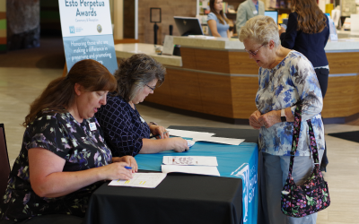 ISHS Staff Signing in Guests at the Esto Perpetua Awards