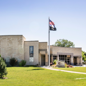 Photo of the Idaho State Museum on a blue sky day.