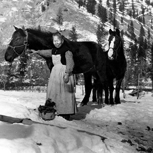 Polly Bemis Leading Horses through Snow